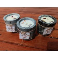 Lightblue and black cylindrical candle